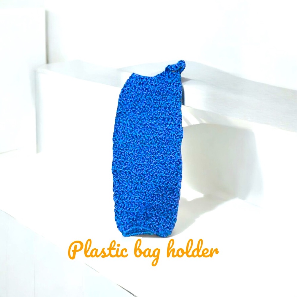 Blue handmade crocheted plastic bag holder. Load from top, pull from bottom.
